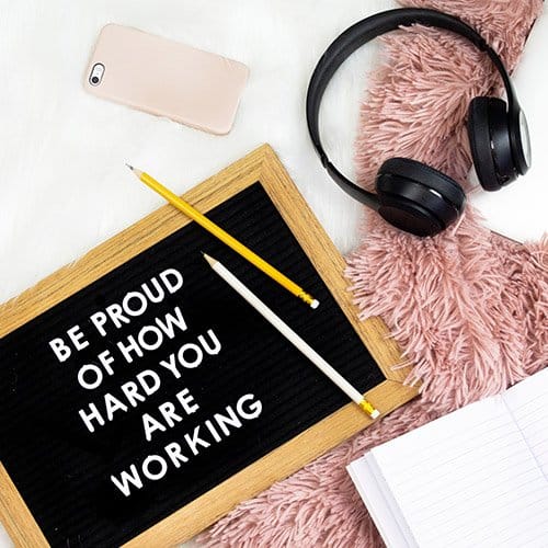 Letterboard that says "be proud of how hard you are working"